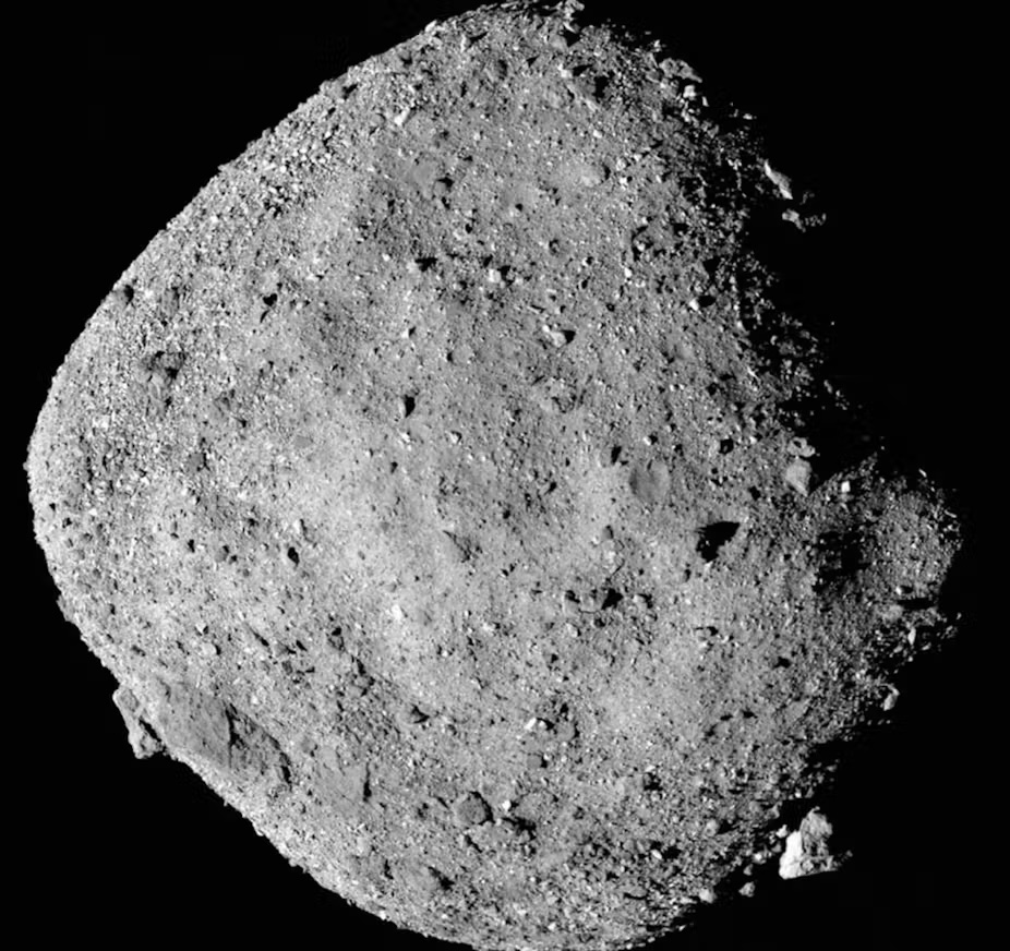 A photo of an asteroid with a rocky, dusty surface.