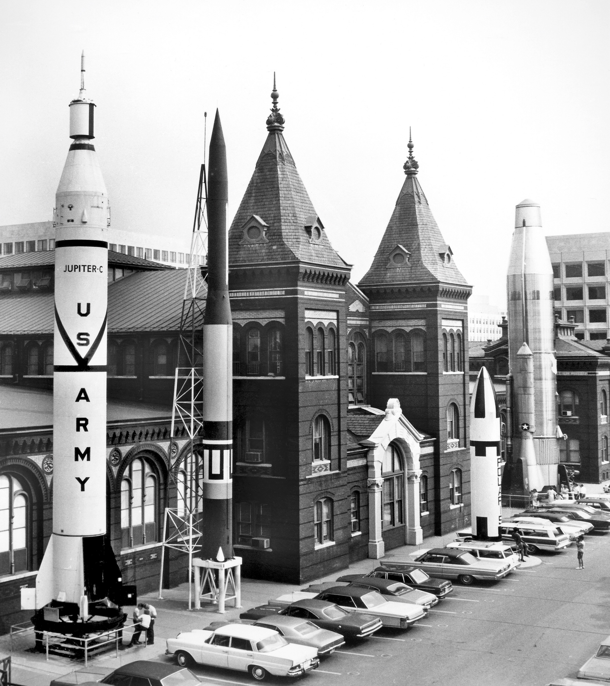 Four rockets on the outside of a brick building