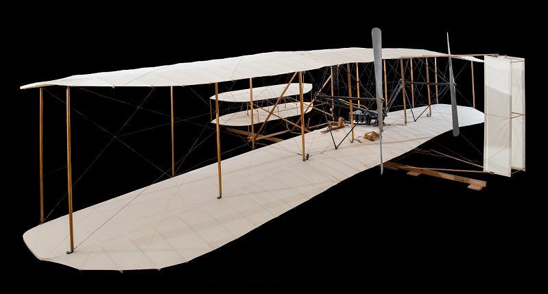 The Wright Flyer plane with a black background