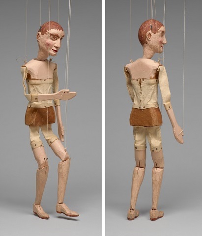 Wooden marionette in ballerina tutu