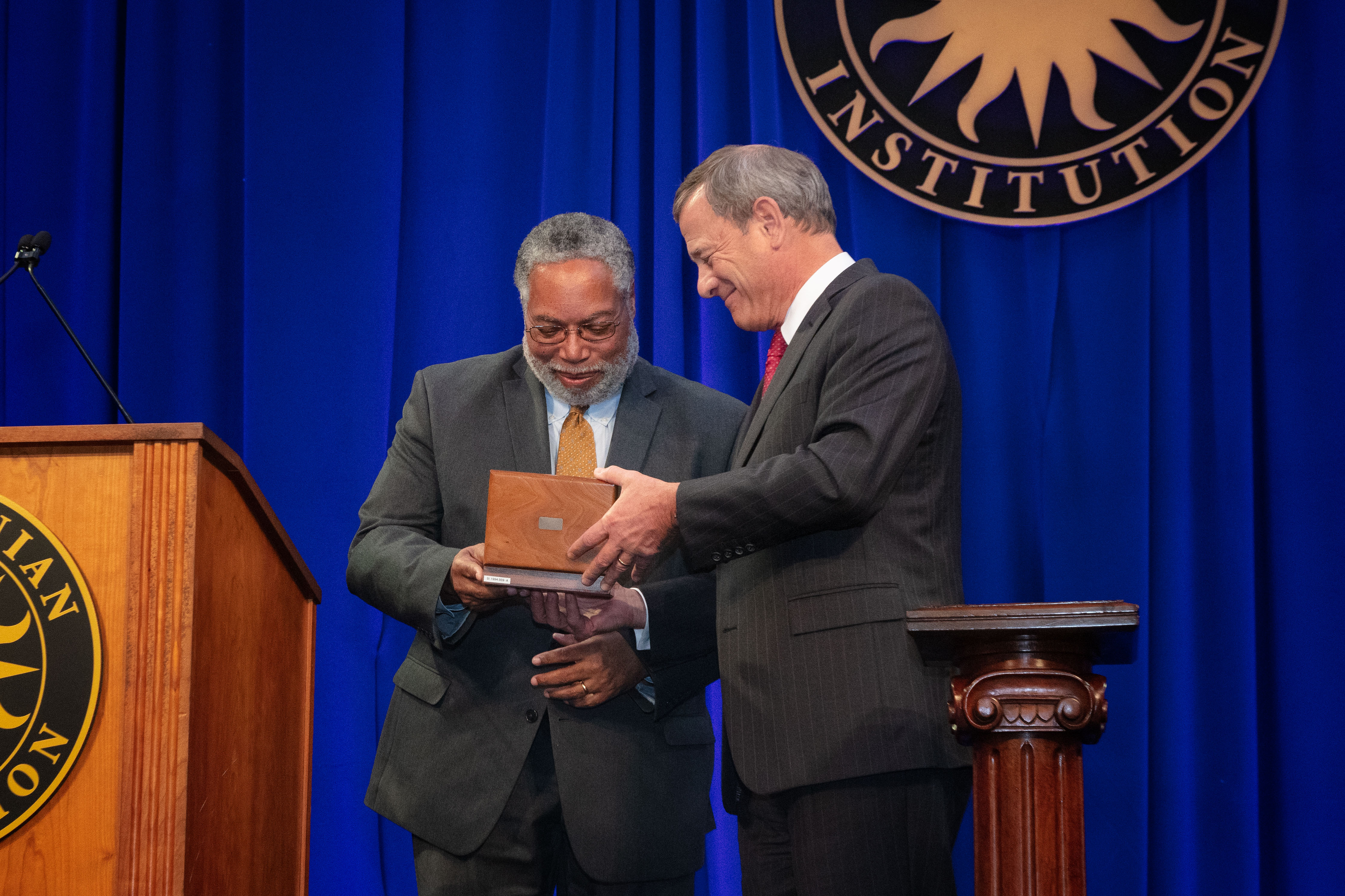 Lonnie Bunch and Justice Roberts