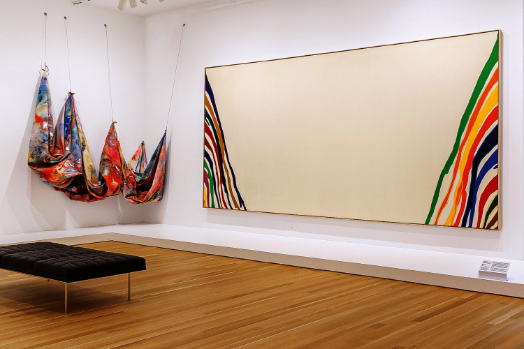 Sam Gilliam’s draped, suspended canvases hang differently every time they are installed. Swing is placed next to Morris Louis’ Beta Upsilon in one of many new galleries that bring recent acquisitions and museum classics together around themes and ideas such as language and communication, the rise and impact of feminism, and notions of national and personal identity. PHOTO Albert Ting