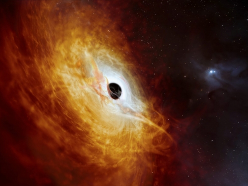 A small black circle surrounded by fiery red and orange colors.