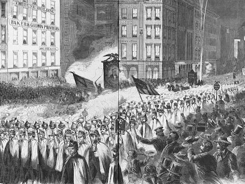 An illustrated document in black and white that says 'WIDE AWAKE CLUB' and whose central image shows crowds and troops before th