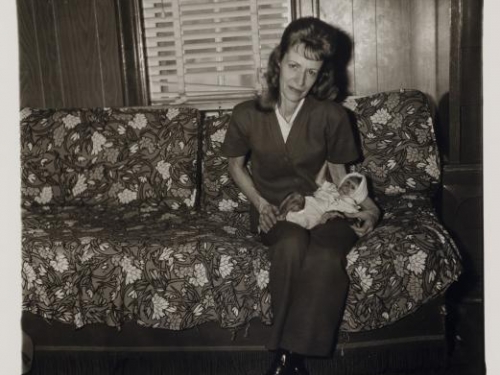 Arbus photo of woman with baby monkey