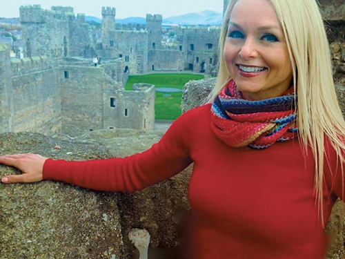 Christine van Blokland getting curious at Caernarfon Castle in Wales (Curious Tr