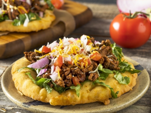 cafe exterior with chef and fry bread