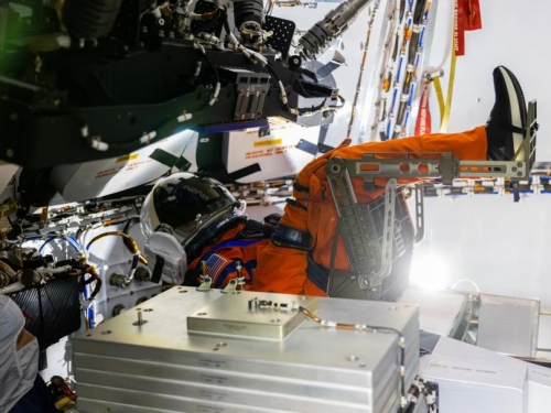 A view of Moonikin Campos secured in a seat inside the Artemis I Orion crew module.