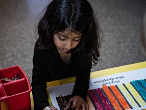 young girl coloring