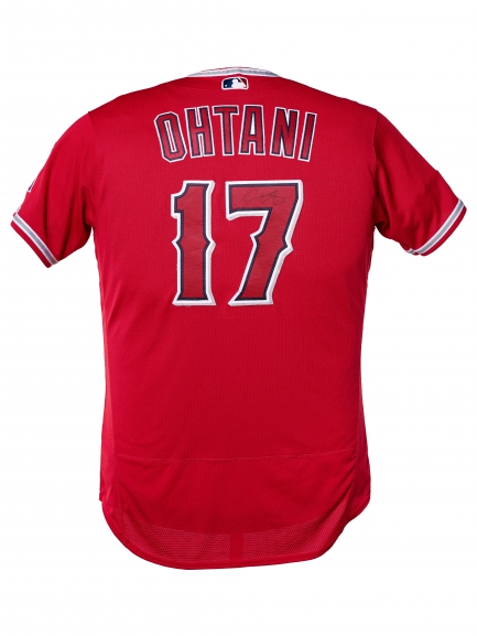 Photo of back of red jersey with number 17 and name Ohtani.